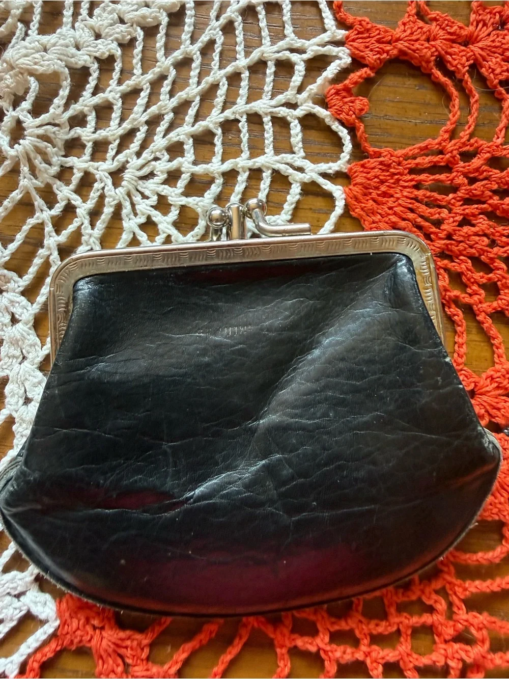 Vintage mid-century black leather coin purse with kiss-lock frame